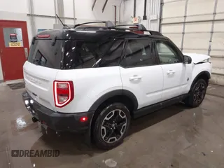 2021 Ford Bronco Sport Outer Banks z VIN 3FMCR9C61MRB05235, wystawiony jako IAAI lot #41726178 z przebiegiem 30 416 mil mil oraz . Historia ofert i sprzedaży dostępna na DreamBid. Obrazek 4.
