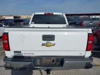 2014 Chevrolet Silverado 1500 LT with VIN 1GCRCREH0EZ399724, listed as a IAAI auction lot 41572451 with 61,799 mi miles and . Bid and sale history available at DreamBid. Image 16.