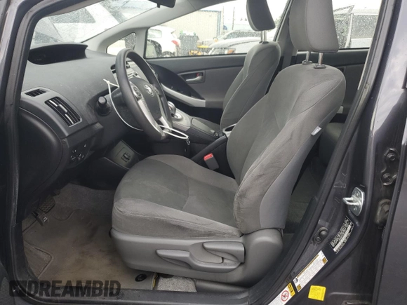2012 Toyota Prius with VIN JTDKN3DP6C3021831, listed as a Copart auction lot 63462615 with 126,674 mi miles and Salvage title. Bid and sale history available at DreamBid. Image 7.