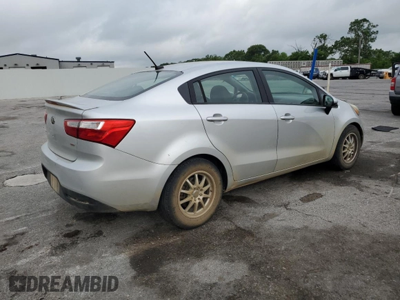 2013 Kia Rio LX z VIN KNADM4A35D6280066, wystawiony jako Copart lot #57293585 z przebiegiem 129 281 mil mil oraz Szkoda całkowita • Salvage title. Historia ofert i sprzedaży dostępna na DreamBid. Obrazek 3.