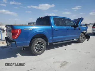 2022 Ford F-150 XL with VIN 1FTEW1EP2NKD74606, listed as a Copart auction lot 49573965 with 63,117 mi miles and Salvage Title. Bid and sale history available at carsss.com. Image 3.