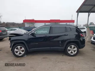 2018 Jeep Compass Altitude with VIN 3C4NJDBB0JT350175, listed as a IAAI auction lot 41544527 with 95,998 mi miles and . Bid and sale history available at carsss.com. Image 14.