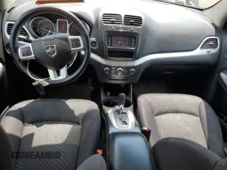 2013 Dodge Journey SE with VIN 3C4PDCAB0DT500365, listed as a Copart auction lot 61033665 with 193,231 mi miles and Salvage title. Bid and sale history available at DreamBid. Image 8.