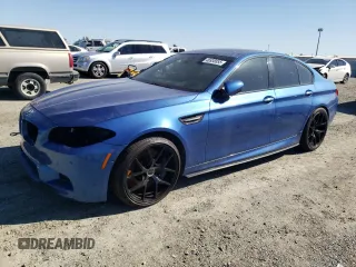 2013 BMW M5 with VIN WBSFV9C51DC773404, listed as a Copart auction lot 46938855 with 114,752 mi miles and Salvage Title. Bid and sale history available at carsss.com. Image 1.