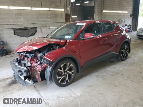 2018 Toyota C-HR XLE with VIN NMTKHMBX7JR032119, listed as a Copart auction lot 61007975 with 100,093 mi miles and Salvage title. Bid and sale history available at DreamBid. Image 1.