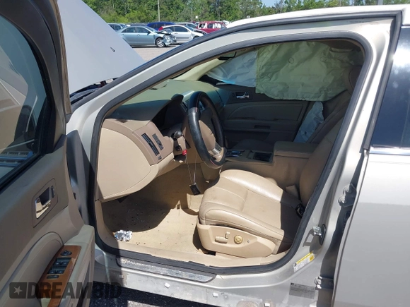 2008 Cadillac STS RWD with VIN 1G6DW67V080210732, listed as a IAAI auction lot 40825753 with 78,391 mi miles and . Bid and sale history available at DreamBid. Image 5.