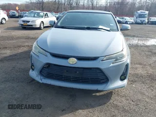 2014 Scion tC z VIN JTKJF5C71E3081033, wystawiony jako IAAI lot #41928949 z przebiegiem 144 112 mil mil oraz . Historia ofert i sprzedaży dostępna na DreamBid. Obrazek 17.