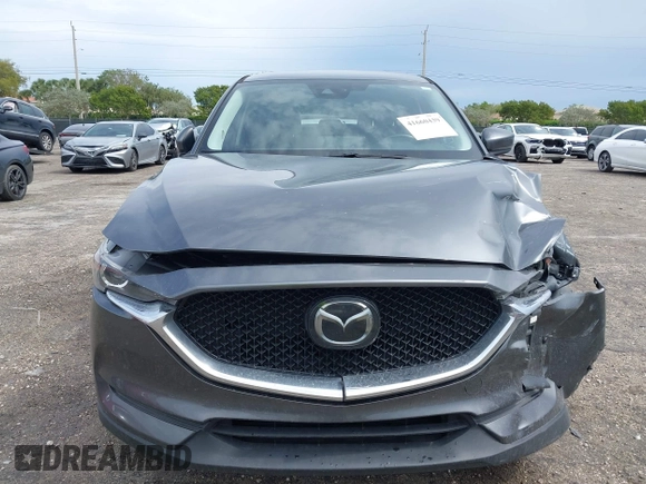 2021 Mazda CX-5 Touring with VIN JM3KFACM1M0461510, listed as a IAAI auction lot 41660439 with 30,352 mi miles. Bid and sale history available at carsss.com. Image 6.