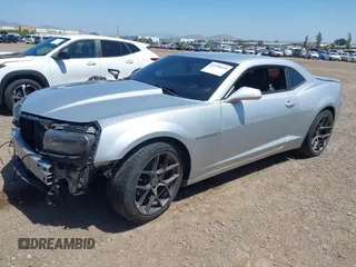 2014 Chevrolet Camaro LT z VIN 2G1FG1E30E9207699, wystawiony jako IAAI lot #42256519 z przebiegiem 107 219 mil mil oraz . Historia ofert i sprzedaży dostępna na DreamBid. Obrazek 2.