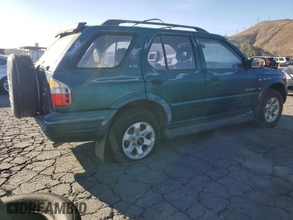 1999 Isuzu Rodeo S with VIN 4S2CK58W1X4349947, listed as a Copart auction lot 84634064 with 135,851 mi miles and Clean Title. Bid and sale history available at DreamBid. Image 3.