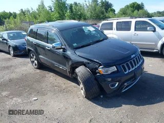 2015 Jeep Grand Cherokee Overland z VIN 1C4RJFCGXFC839869, wystawiony jako IAAI lot #42376494 z przebiegiem 147 955 mil mil oraz . Historia ofert i sprzedaży dostępna na DreamBid. Obrazek 1.