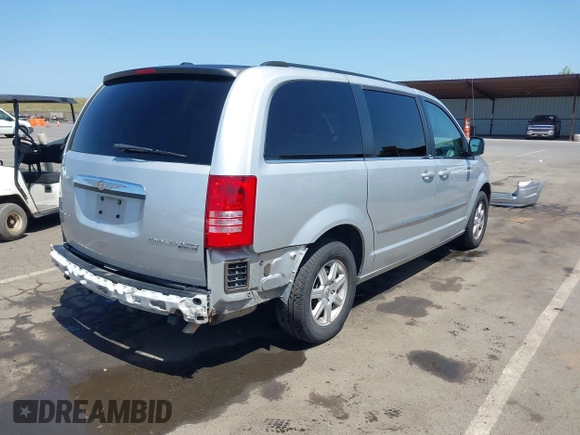 2010 Chrysler Town & Country Touring with VIN 2A4RR5D11AR346489, listed as a IAAI auction lot 42102358 with 150,860 mi miles. Bid and sale history available at carsss.com. Image 4.