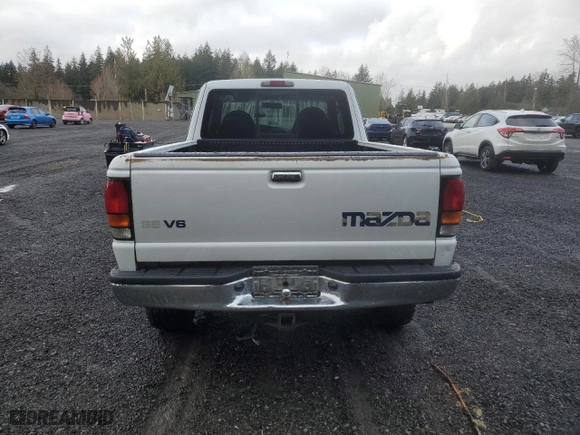 2000 Mazda B-Series 4WD Truck SE with VIN 4F4ZR17X5YTM04614, listed as a Copart auction lot 48530175 with 187,702 mi miles and Salvage Title. Bid and sale history available at carsss.com. Image 6.