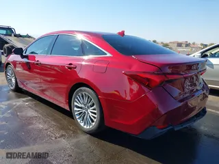 2019 Toyota Avalon Hybrid Limited with VIN 4T1B21FB8KU010221, listed as a IAAI auction lot 41470592 with 100,869 mi miles. Bid and sale history available at carsss.com. Image 3.