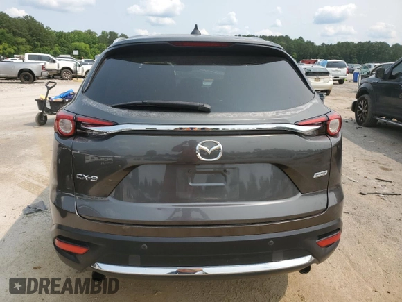 2017 Mazda CX-9 Grand Touring z VIN JM3TCADYXH0138805, wystawiony jako Copart lot #59201915 z przebiegiem 147 896 mil mil oraz Czysty tytuł • Clean title. Historia ofert i sprzedaży dostępna na DreamBid. Obrazek 6.