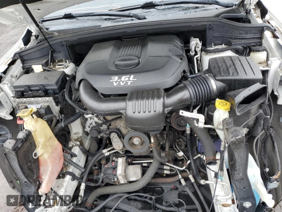 2014 Jeep Grand Cherokee Limited with VIN 1C4RJFBG9EC200141, listed as a Copart auction lot 60507385 with 101,917 mi miles and Salvage title. Bid and sale history available at DreamBid. Image 12.