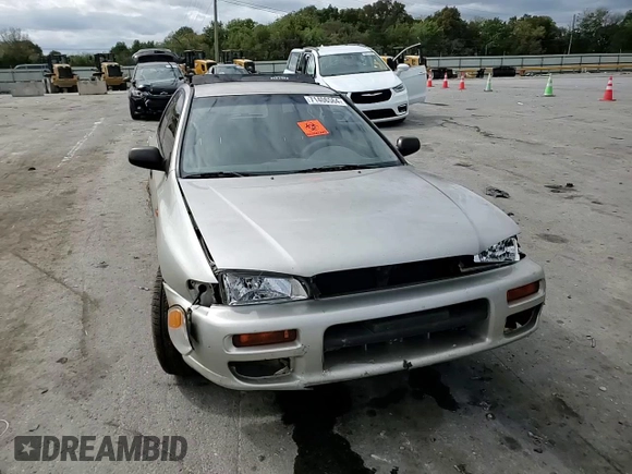 1999 Subaru Impreza L с VIN JF1GF4351XH815210, выставлен на аукционе Copart как лот 71250504 с пробегом 141 806 миль миль и Списание • Salvage title. История ставок и продаж доступна на DreamBid. Изображение 11.