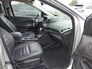 2015 Ford Escape Titanium with VIN 1FMCU0JX7FUB60418, listed as a IAAI auction lot 42485107 with 82,172 mi miles and . Bid and sale history available at DreamBid. Image 5.