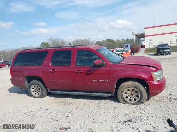 2007 Chevrolet Suburban LT with VIN 1GNFC16J97J355929, listed as a IAAI auction lot 41626223 with 186,644 mi miles. Bid and sale history available at carsss.com. Image 13.