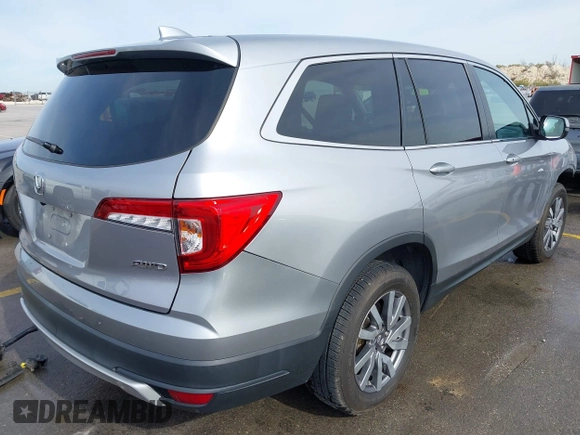 2020 Honda Pilot EX z VIN 5FNYF6H37LB056638, wystawiony jako IAAI lot #41277619 z przebiegiem 62 213 mil mil oraz . Historia ofert i sprzedaży dostępna na DreamBid. Obrazek 4.