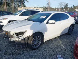 2018 Acura TLX w/Technology Pkg with VIN 19UUB1F59JA006980, listed as a IAAI auction lot 41324003 with 70,825 mi miles. Bid and sale history available at carsss.com. Image 2.
