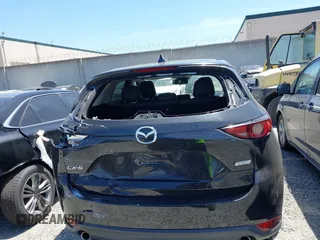 2018 Mazda CX-5 Grand Touring with VIN JM3KFADM4J0326760, listed as a IAAI auction lot 41885100 with 82,091 mi miles and . Bid and sale history available at DreamBid. Image 16.