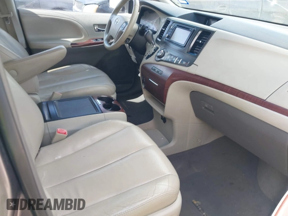 2014 Toyota Sienna XLE with VIN 5TDYK3DC0ES513076, listed as a IAAI auction lot 42724629 with 154,019 mi miles and . Bid and sale history available at DreamBid. Image 5.