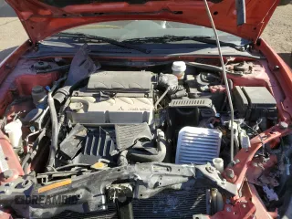 2012 Mitsubishi Eclipse GS Sport with VIN 4A37L5EF1CE002215, listed as a Copart auction lot 86103984 with 74,716 mi miles and Salvage Title. Bid and sale history available at DreamBid. Image 12.