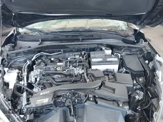 2023 Toyota Corolla Cross XLE with VIN 7MUDAAAG8PV072030, listed as a IAAI auction lot 42397573 with 6,584 mi miles and . Bid and sale history available at DreamBid. Image 10.