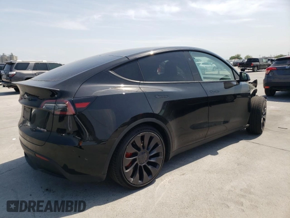 2023 Tesla Model Y Performance with VIN 7SAYGDEF9PF947667, listed as a Copart auction lot 52314795 with 40,634 mi miles and Salvage Title. Bid and sale history available at DreamBid. Image 3.