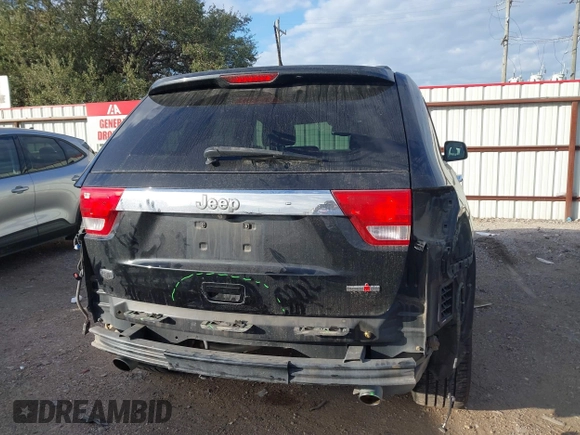 2013 Jeep Grand Cherokee Overland with VIN 1C4RJECT2DC546634, listed as a IAAI auction lot 41180807 with 111,897 mi miles. Bid and sale history available at carsss.com. Image 6.