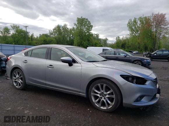 2014 Mazda 6 i Grand Touring with VIN JM1GJ1W67E1116357, listed as a Copart auction lot 54351205 with 111,190 mi miles and Salvage Title. Bid and sale history available at DreamBid. Image 4.