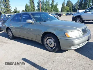 2001 Infiniti Q45 Touring z VIN JNKBY31A41M100704, wystawiony jako IAAI lot #42346520 z przebiegiem 73 073 mil mil oraz . Historia ofert i sprzedaży dostępna na DreamBid. Obrazek 1.