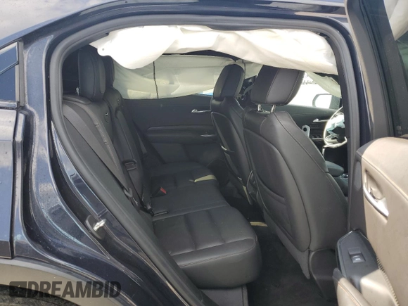 2022 Cadillac XT4 FWD Sport with VIN 1GYFZER46NF119009, listed as a Copart auction lot 57651725 with 37,896 mi miles and Salvage title. Bid and sale history available at DreamBid. Image 11.