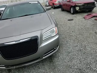 2014 Chrysler 300 with VIN 2C3CCAAG0EH203709, listed as a Copart auction lot 50055075 with 161,043 mi miles and Salvage Title. Bid and sale history available at carsss.com. Image 13.