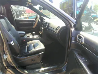 2014 Jeep Grand Cherokee Limited with VIN 1C4RJEBG7EC482872, listed as a IAAI auction lot 41991274 with 125,343 mi miles and . Bid and sale history available at DreamBid. Image 5.