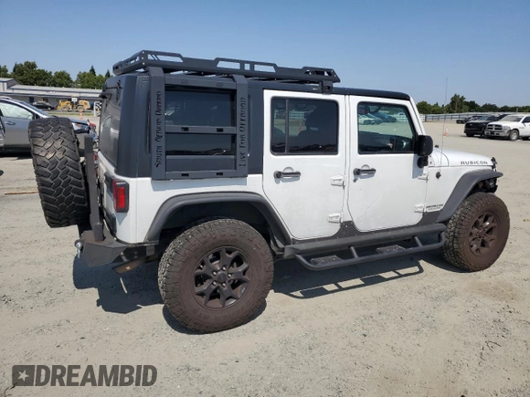 2014 Jeep Wrangler Unlimited Rubicon with VIN 1C4BJWFG0EL201559, listed as a Copart auction lot 59580575 with 182,101 mi miles and Salvage title. Bid and sale history available at DreamBid. Image 3.