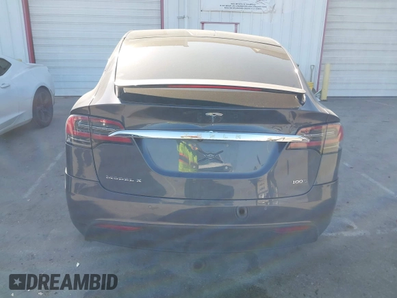 2018 Tesla Model X 75D with VIN 5YJXCDE28JF142509, listed as a IAAI auction lot 41993444 with 100,244 mi miles and . Bid and sale history available at carsss.com. Image 16.