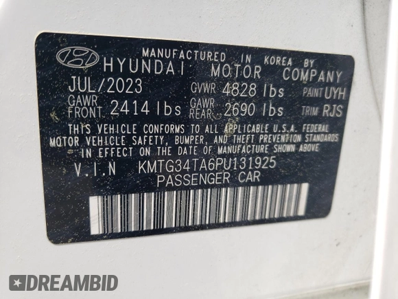 2023 Genesis G70 2.0T z VIN KMTG34TA6PU131925, wystawiony jako Copart lot #52611895 z przebiegiem 30 474 mil mil oraz Szkody całkowita. Historia ofert i sprzedaży dostępna na DreamBid. Obrazek 14.