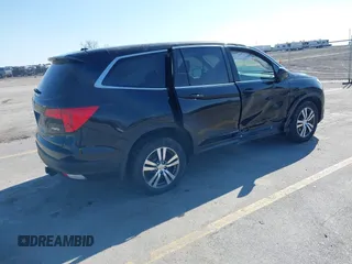 2017 Honda Pilot EX-L with VIN 5FNYF6H54HB024349, listed as a IAAI auction lot 42082517 with 108,000 mi miles and . Bid and sale history available at DreamBid. Image 4.