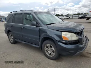 2003 Honda Pilot EX z VIN 2HKYF18563H543125, wystawiony jako Copart lot #56541455 z przebiegiem 241 804 mil mil oraz Szkoda całkowita • Salvage title. Historia ofert i sprzedaży dostępna na DreamBid. Obrazek 4.