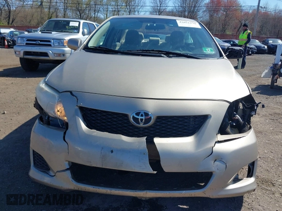 2009 Toyota Corolla with VIN 1NXBU40E09Z144942, listed as a IAAI auction lot 42051178 with 101,564 mi miles and . Bid and sale history available at DreamBid. Image 12.