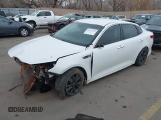 2017 Kia Optima LX with VIN 5XXGT4L32HG171992, listed as a IAAI auction lot 41477494 with 119,415 mi miles. Bid and sale history available at carsss.com. Image 2.