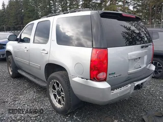 2012 GMC Yukon SLT with VIN 1GKS2CE03CR324366, listed as a IAAI auction lot 41473131 with 161,847 mi miles. Bid and sale history available at carsss.com. Image 3.