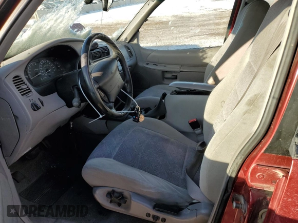 2000 Ford Explorer XLT with VIN 1FMZU73E1YZA57757, listed as a Copart auction lot 89378475 with 220,139 mi miles and Salvage Title. Bid and sale history available at DreamBid. Image 7.