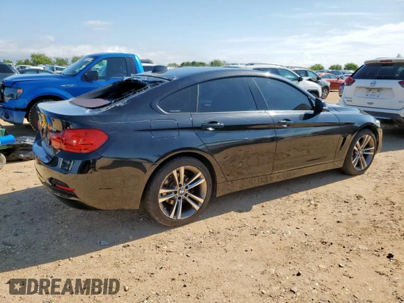2015 BMW 4 Series 428i xDrive with VIN WBA4C9C58FG135373, listed as a Copart auction lot 58545155 with 122,732 mi miles and Salvage title. Bid and sale history available at DreamBid. Image 3.