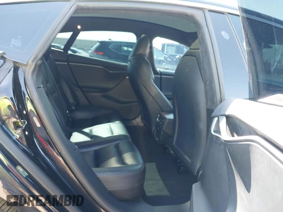 2021 Tesla Model S Long Range Plus with VIN 5YJSA1E28MF426080, listed as a IAAI auction lot 41979326 with 125,328 mi miles and . Bid and sale history available at DreamBid. Image 8.