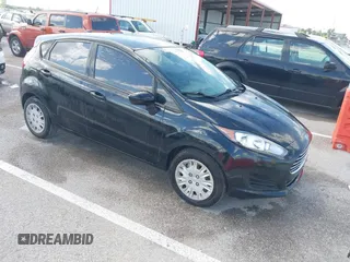 2016 Ford Fiesta S z VIN 3FADP4TJ6GM170966, wystawiony jako IAAI lot #42305014 z przebiegiem 131 835 mil mil oraz . Historia ofert i sprzedaży dostępna na DreamBid. Obrazek 1.