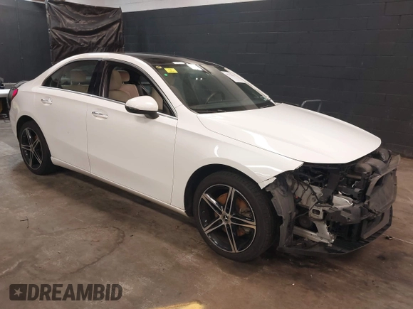 2021 Mercedes-Benz A 220 z VIN W1K3G4FB4MJ305001, wystawiony jako IAAI lot #41755631 z przebiegiem 74 322 mil mil oraz . Historia ofert i sprzedaży dostępna na DreamBid. Obrazek 1.