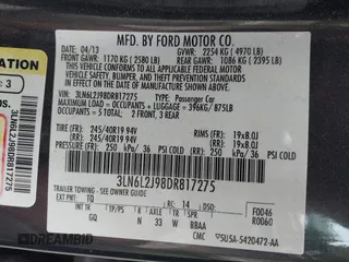 2013 Lincoln MKZ with VIN 3LN6L2J98DR817275, listed as a IAAI auction lot 42196186 with 128,456 mi miles. Bid and sale history available at carsss.com. Image 9.
